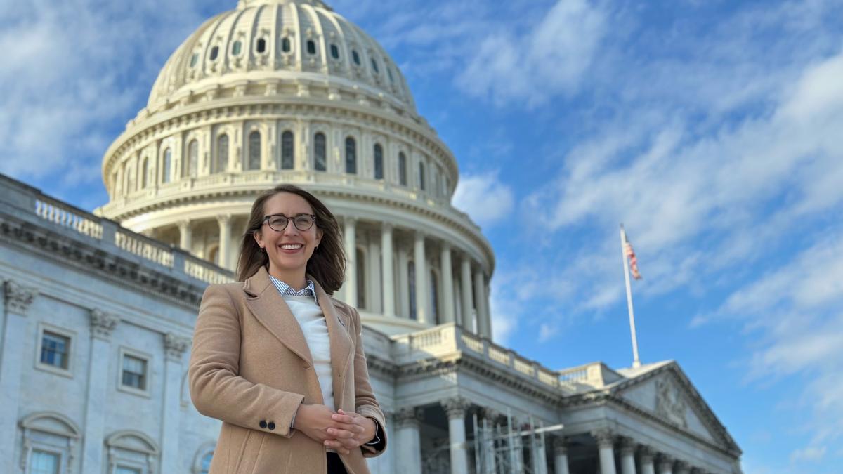 Rep. Hilary Scholten standing in front of Capital